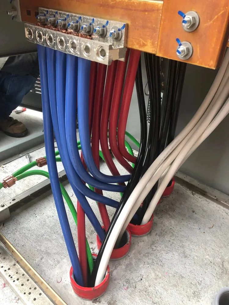High-voltage cable terminations at a bus bar