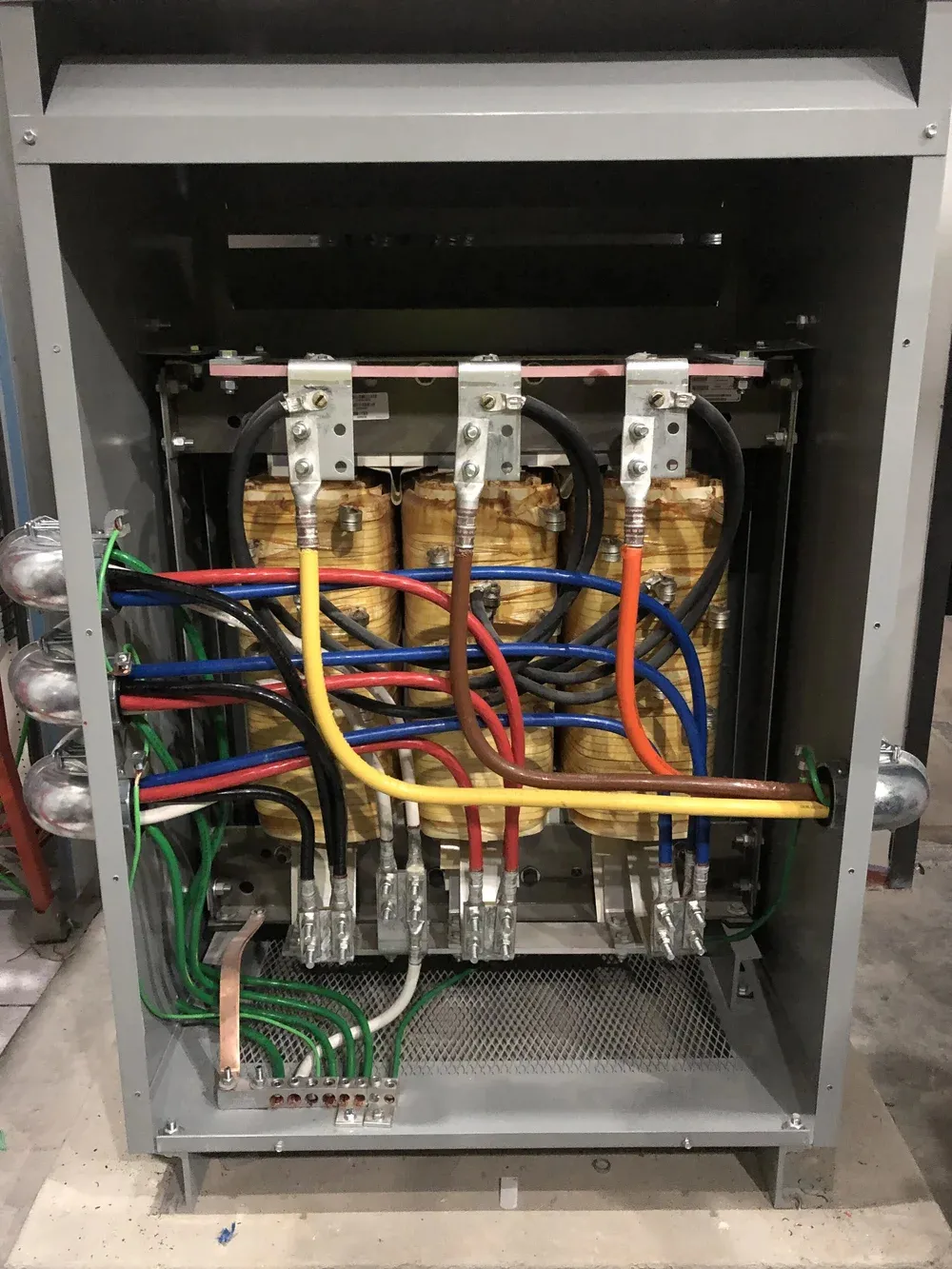 Open electrical enclosure with color-coded conductors