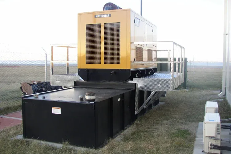Commercial standby generator installed on a fuel tank base