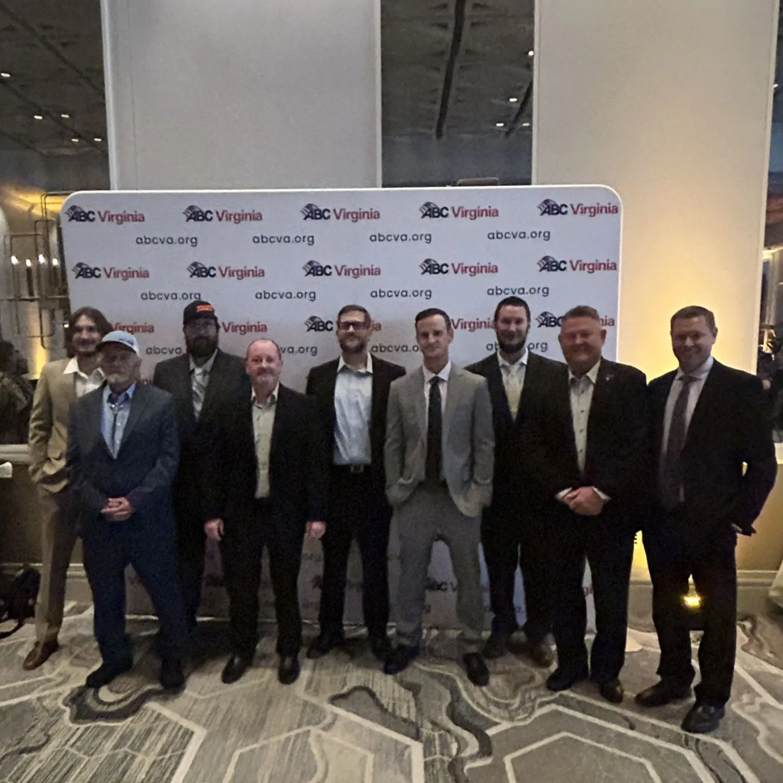 Power Electric team members dressed up together at an ABC Virginia event